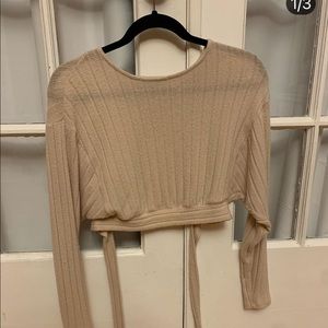 Cropped cream open back tie sweater